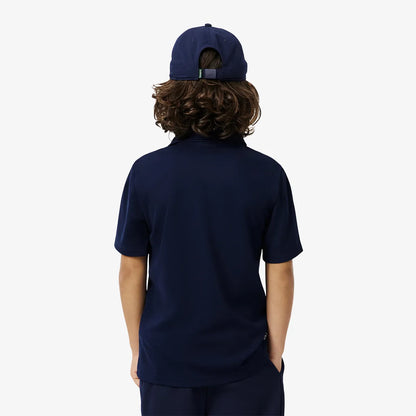 Polo Lacoste Junior Logo